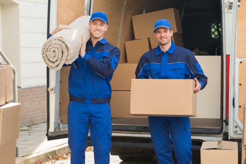 Removal team loading household items for a move in The Hyde