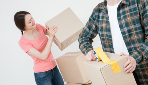 Man and van removals service loading items in The Hyde
