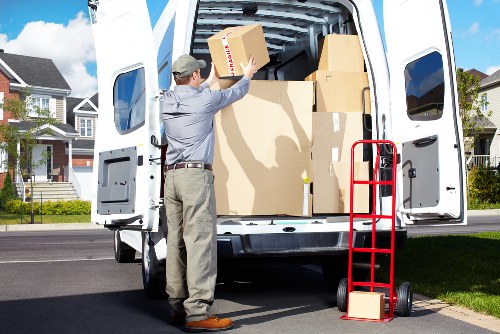 Driver and mover checking a load for safety before transit