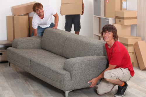 Local office movers handling desks and equipment near The Hyde