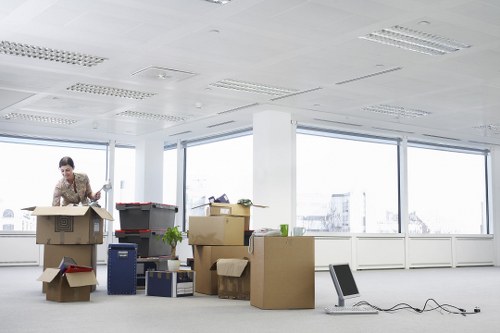 Furniture and office items being prepared for local transport in The Hyde