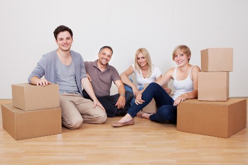 Careful wrapping and boxing of fragile belongings during a move