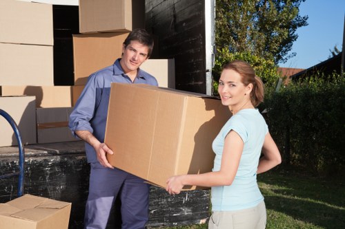 Packed household furniture ready for transport during a move