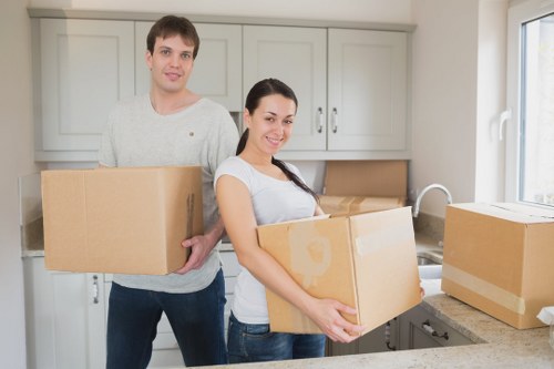 Preparing boxes and furniture for a removals van move in The Hyde